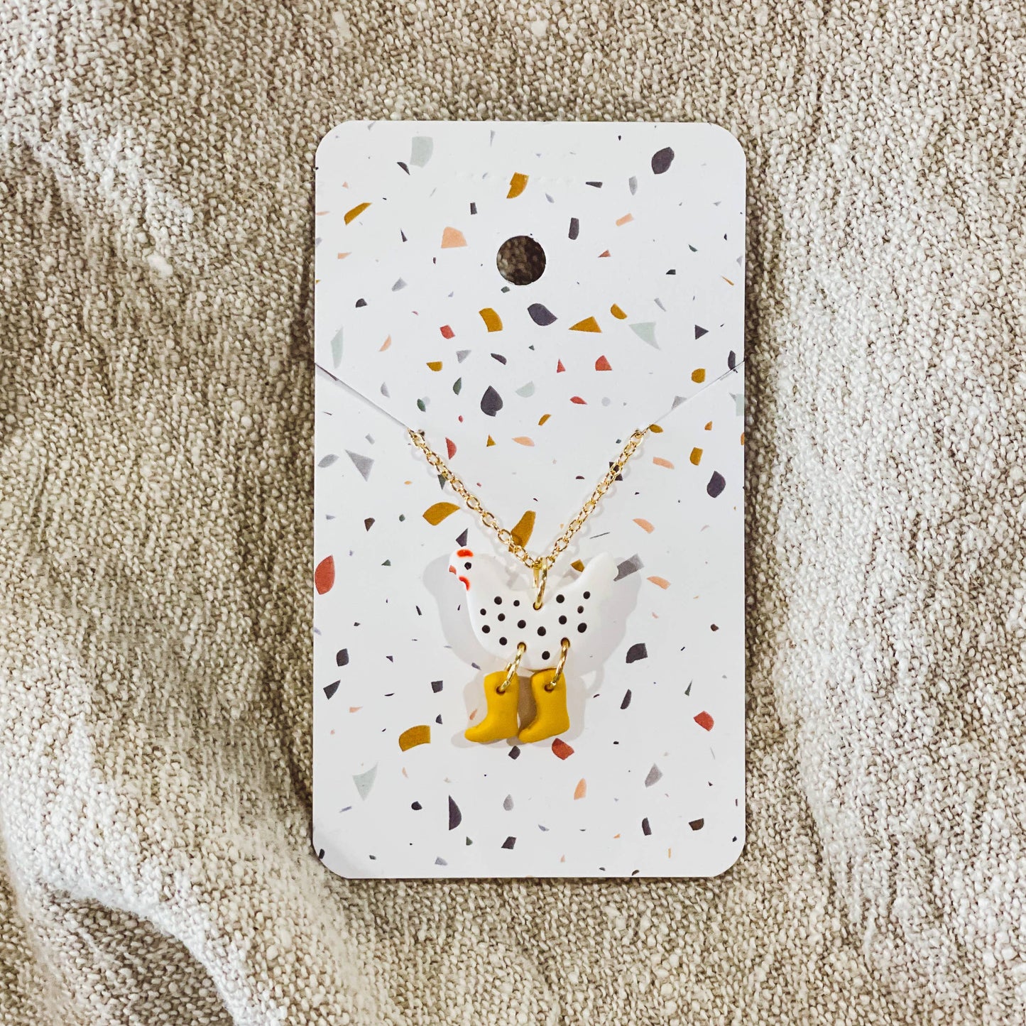 Sydni Carlson Art - Chicken in Rain Boots Necklace, White Polka Dot/Yellow Boots