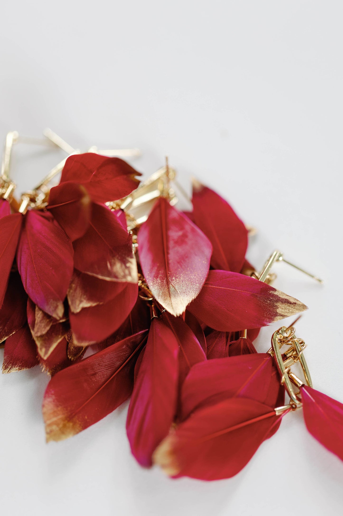 St Armands Designs of Sarasota - Garnet Gold Dipped Feather Statement Earrings