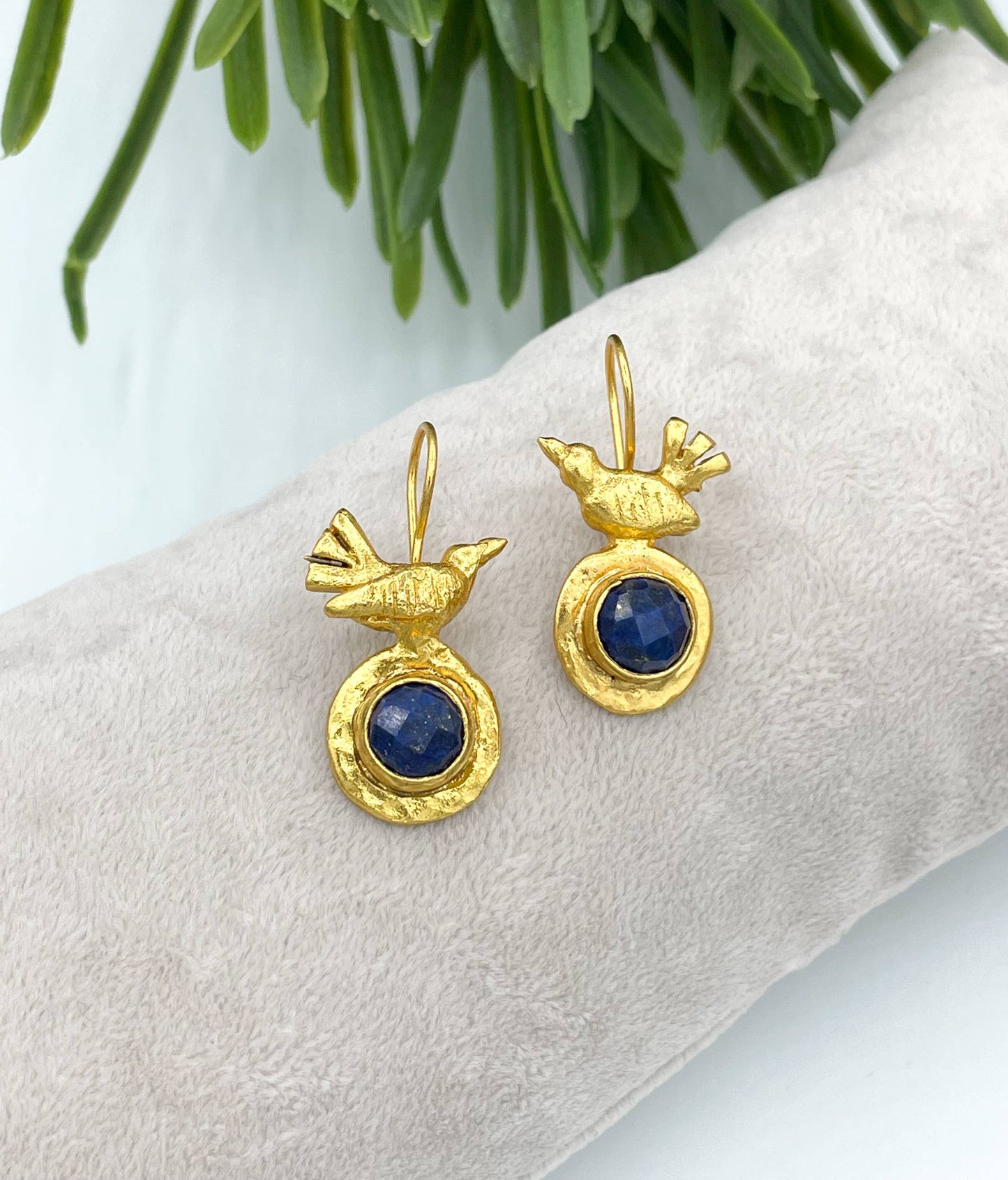 AJS Design Studio - Gold plated bird earring with sapphire