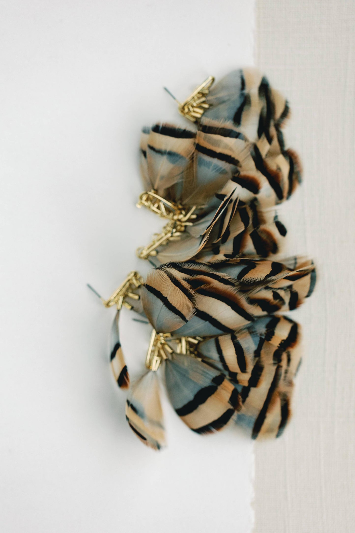 St Armands Designs of Sarasota - Brown Striped Feather Statement Tassel Earrings