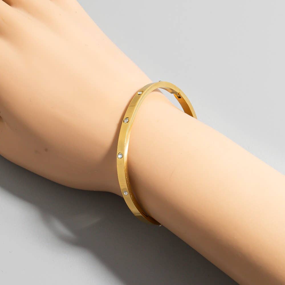 The Looks by Fame Accessories - Stainless Steel Cz Studded Gold Plated Bangle Bracelet: G