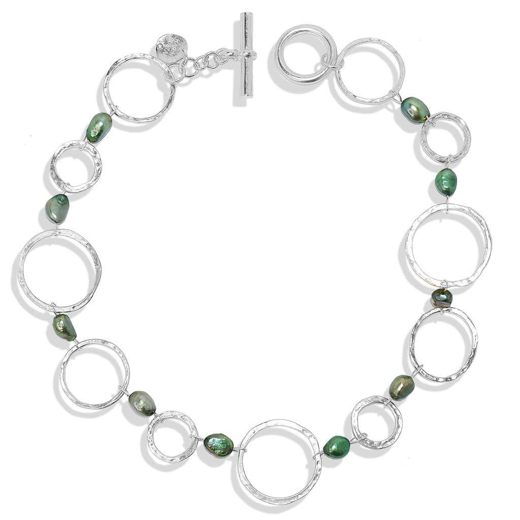 KARINE SULTAN - Hammered circle collar necklace with green pearl accent: Gold