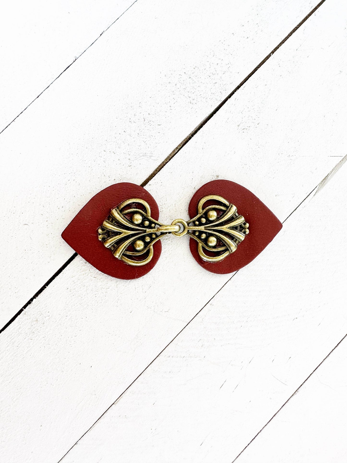 KardiKlips - Dress Clip - Bronze on Dark Red Leather