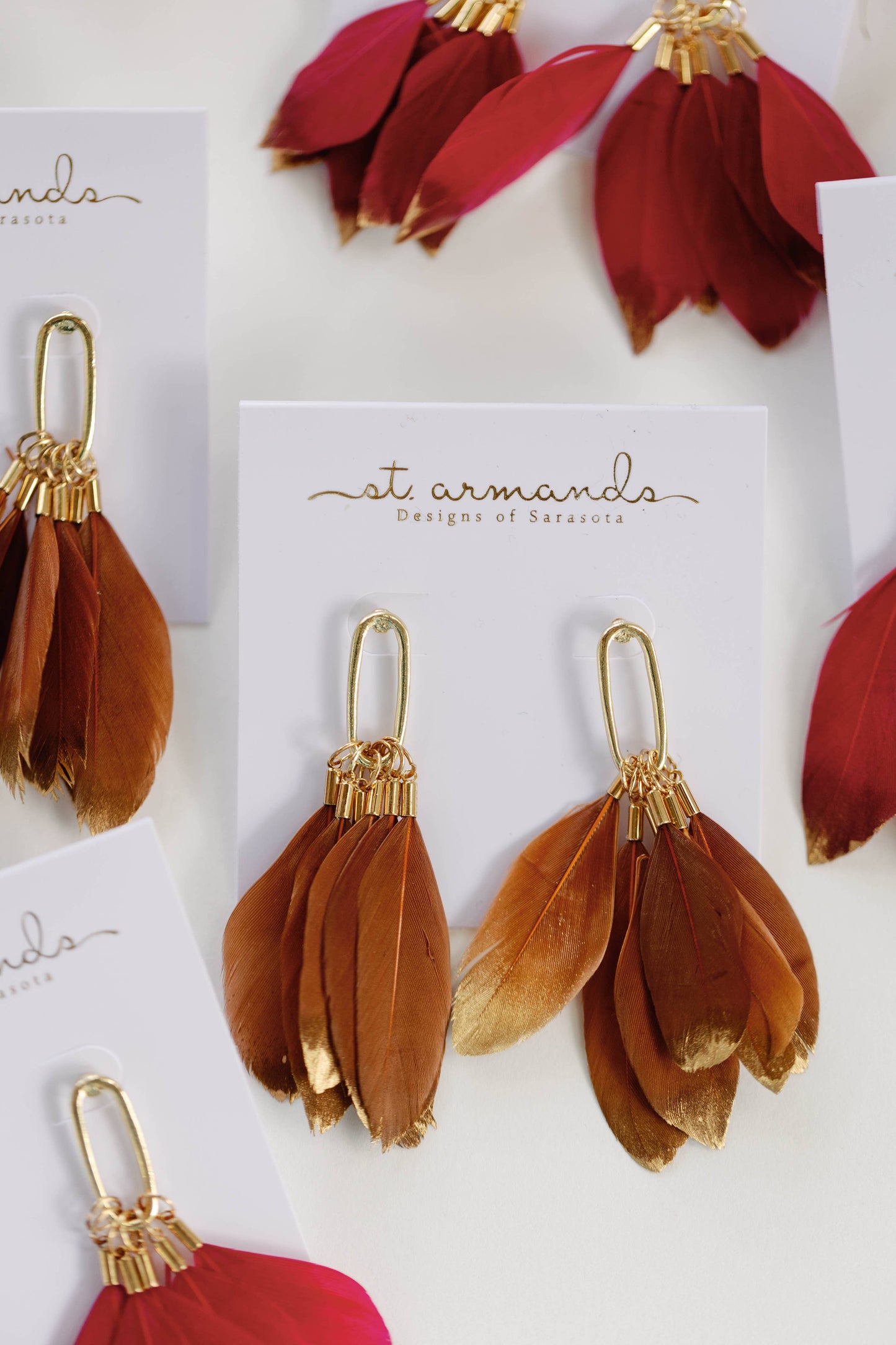 St Armands Designs of Sarasota - Caramel Gold Dipped Feathers Statement Earrings