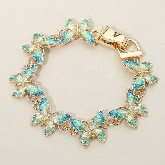 Sensibling Corp. - Butterfly Link Magnetic Bracelet: Blue,Gold