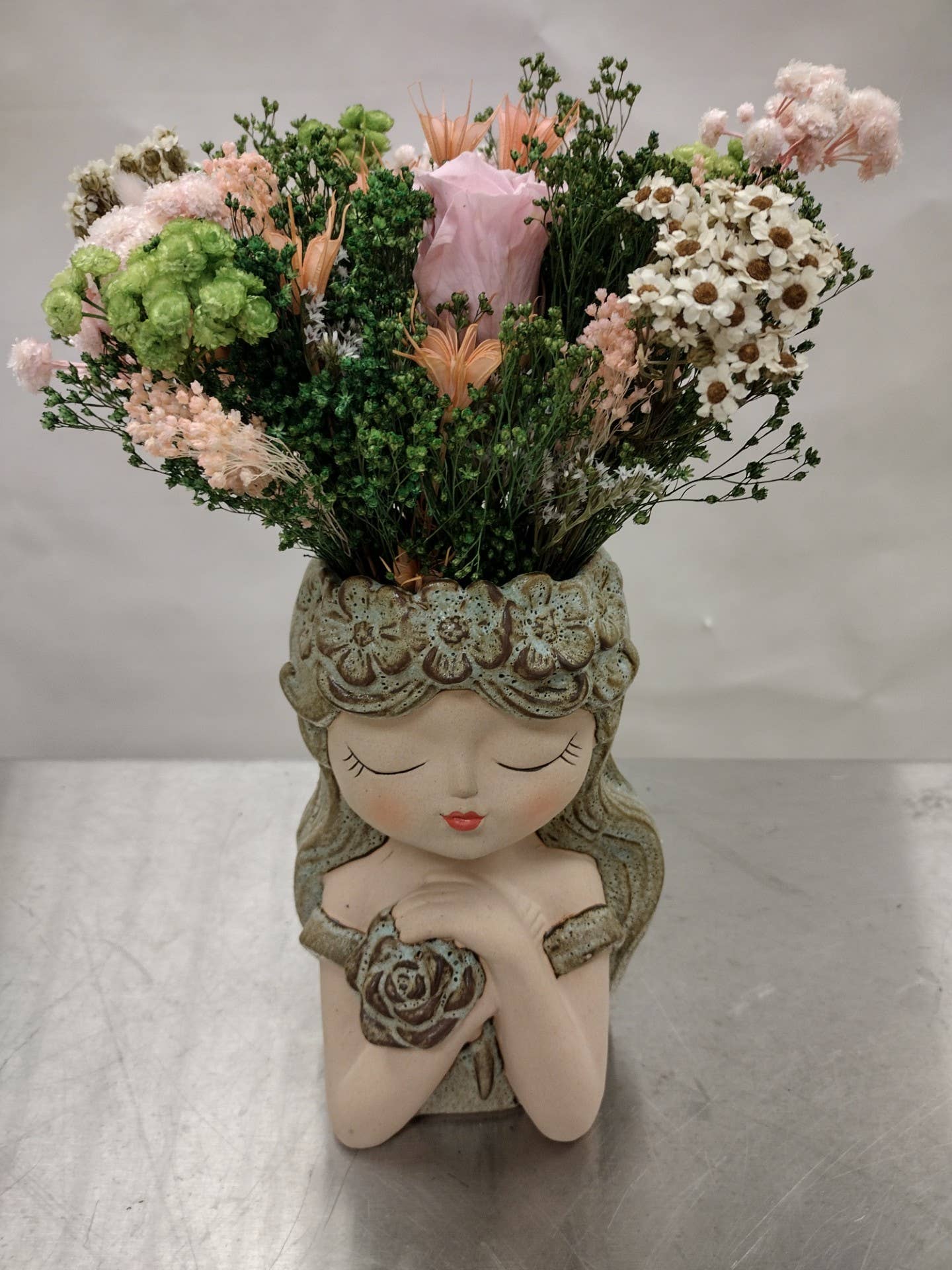 Napco - Planter, Girl w/ Crossed Arms Holding Flower  Item # 17122