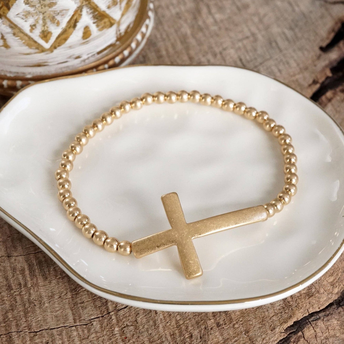 PennyLine inc - Minimal Cross Stretchy Bracelet in Worn Gold tone with Ball Beads