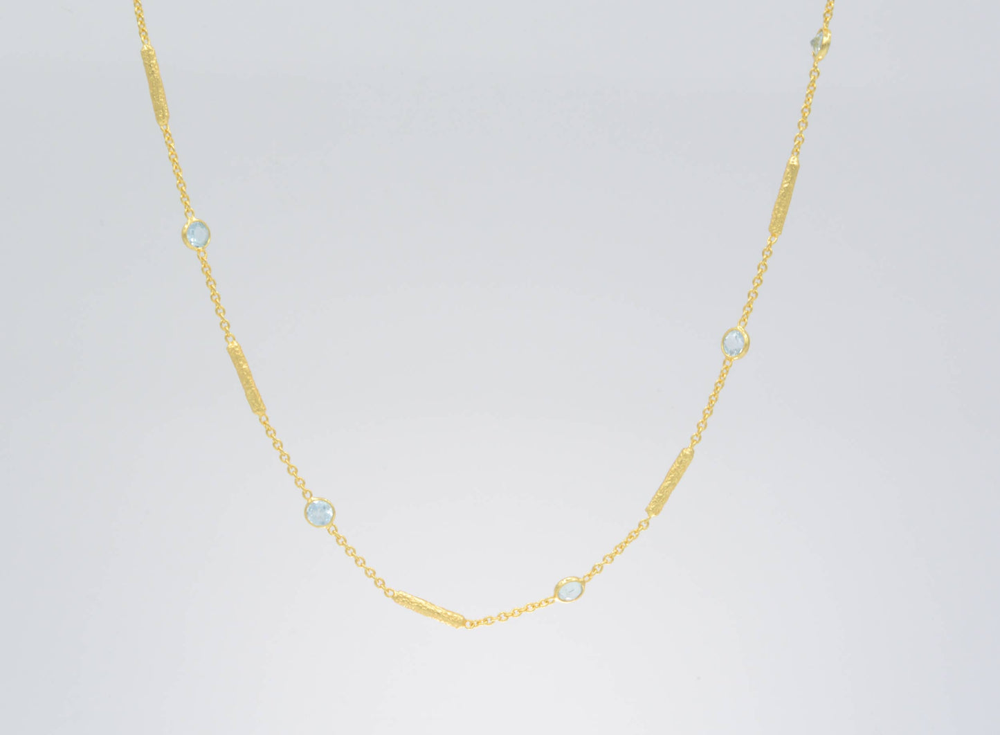 AJS Design Studio - Blue topaz necklace with textured tube spacers
