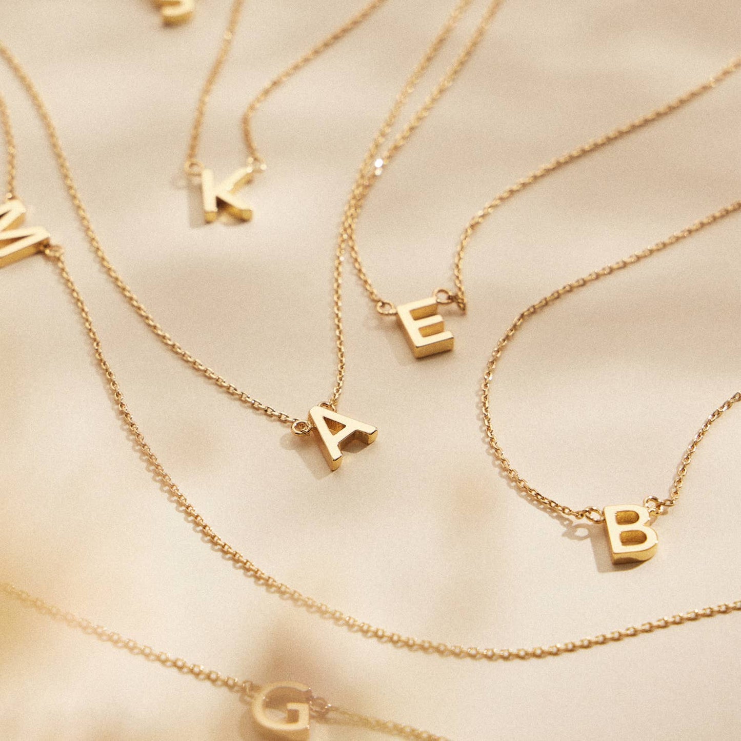 Lilla Haven - 16 Pack of Initial Metal Letter Charm Gold Dip Necklace: 16ASST / One / 4BN12010