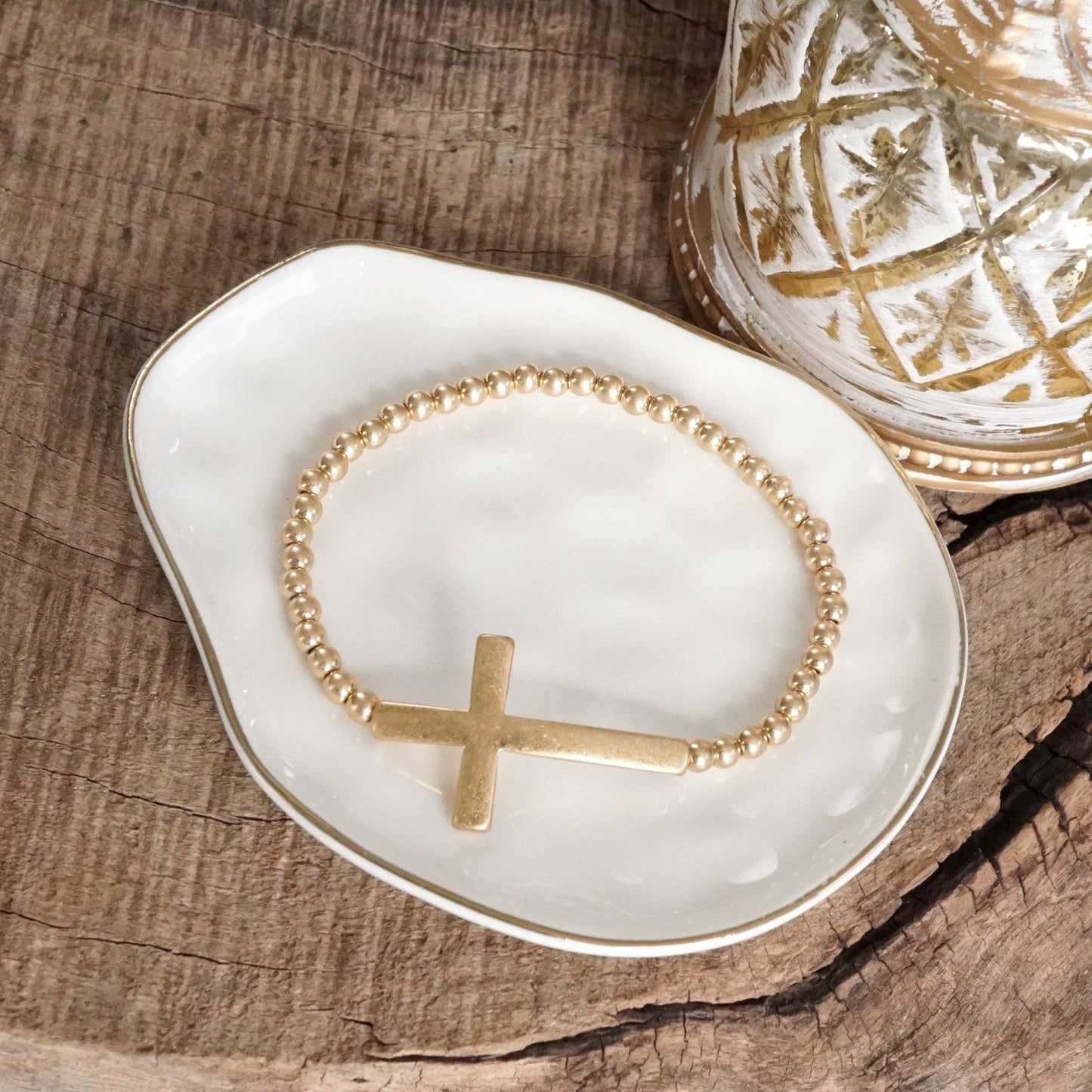 PennyLine inc - Minimal Cross Stretchy Bracelet in Worn Gold tone with Ball Beads