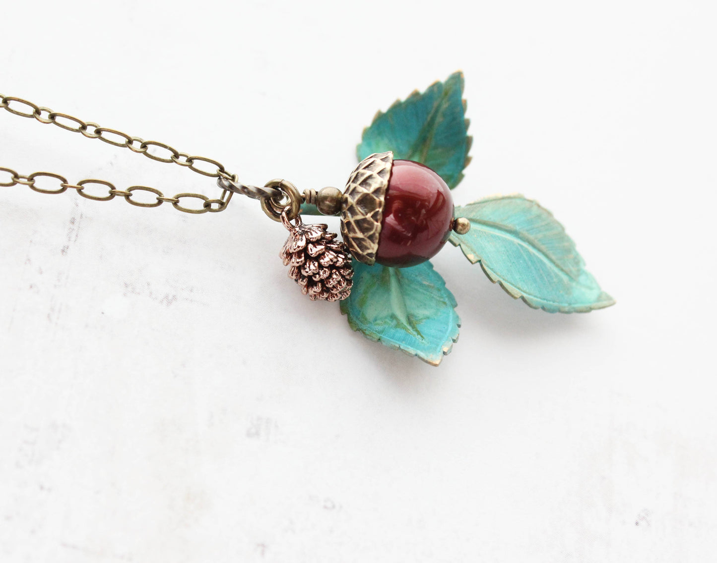 A Pocket of Posies - Charm Necklace - Verdigris Patina Branch: 18 inches / 3. Ivory Cream