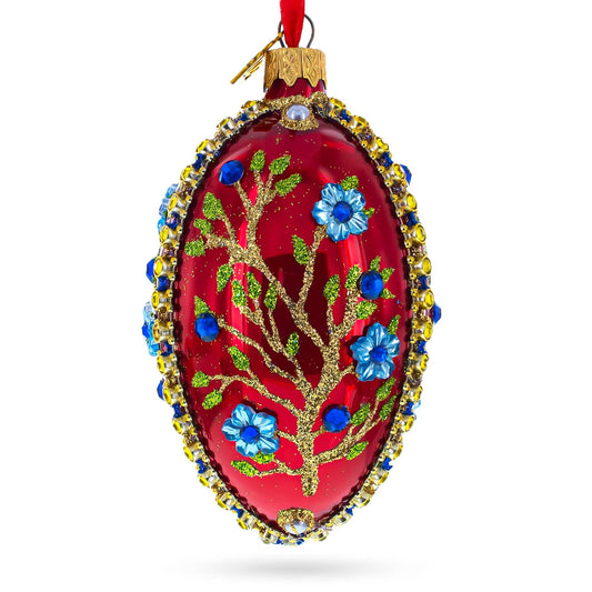 BestPysanky - Blue Bejeweled Flowers on Red Glass Egg Ornament