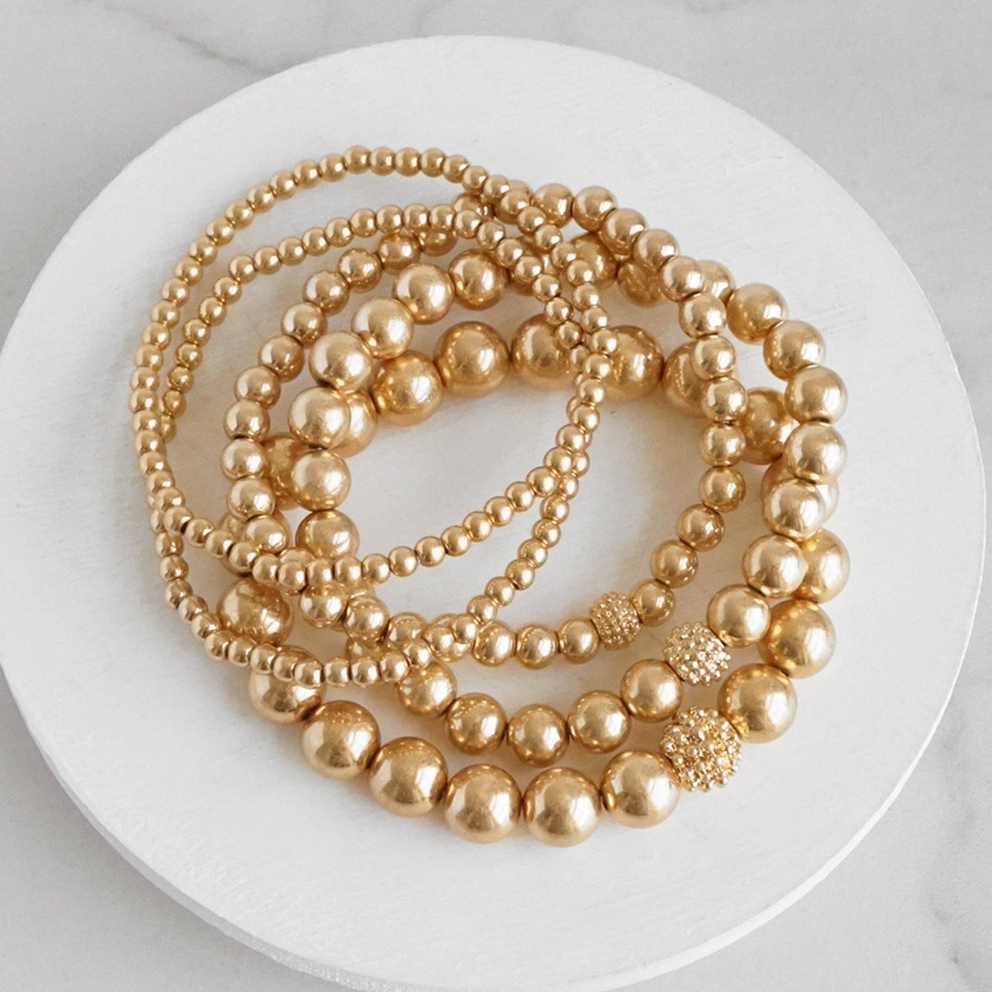 PennyLine inc - Multi size ball beaded bracelet stack Worn Gold tone bracelet set