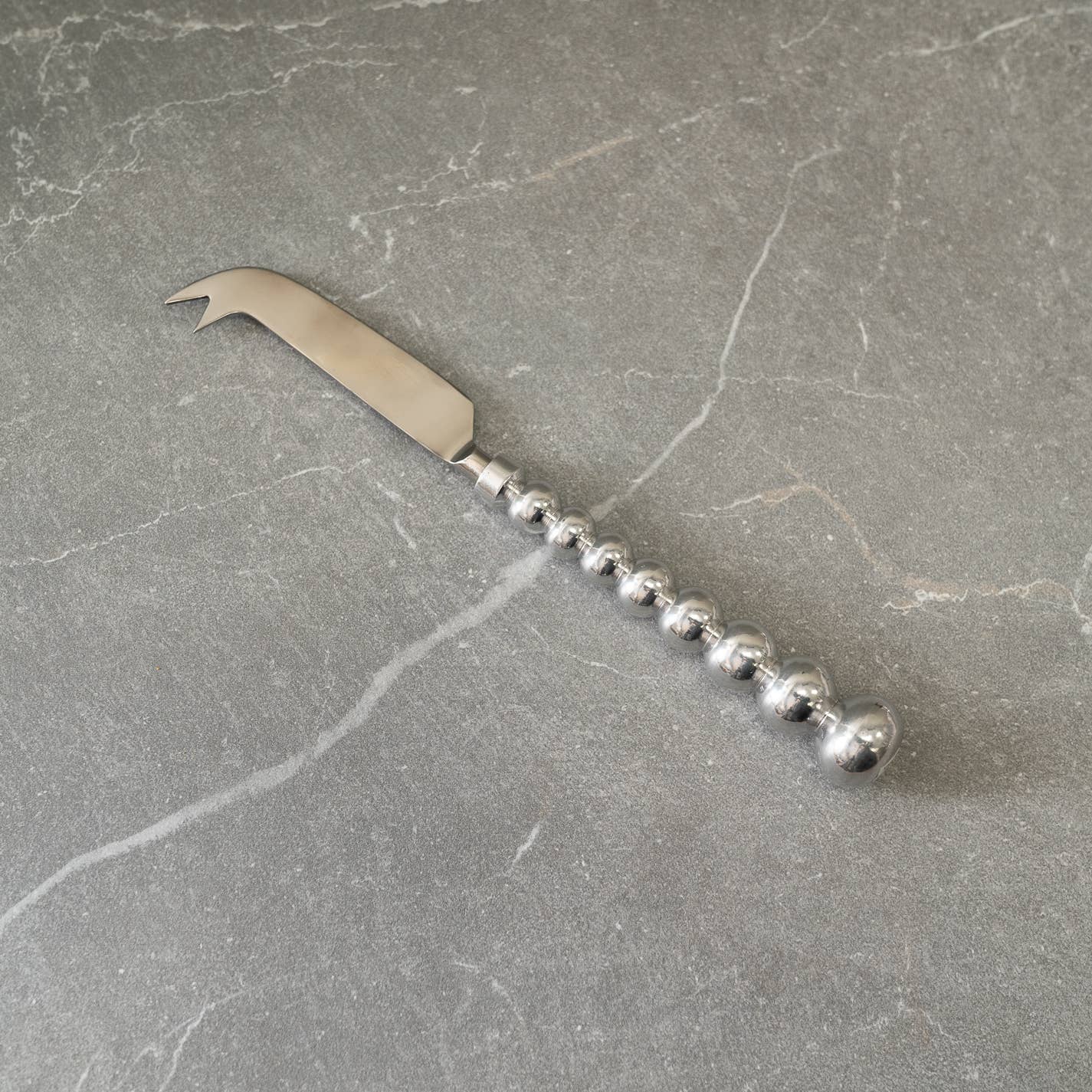 India Handicrafts Inc - Beaded Aluminum Spreader