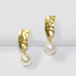 KARINE SULTAN - Cobblestone clip on earrings with pearl dangle.: Gold