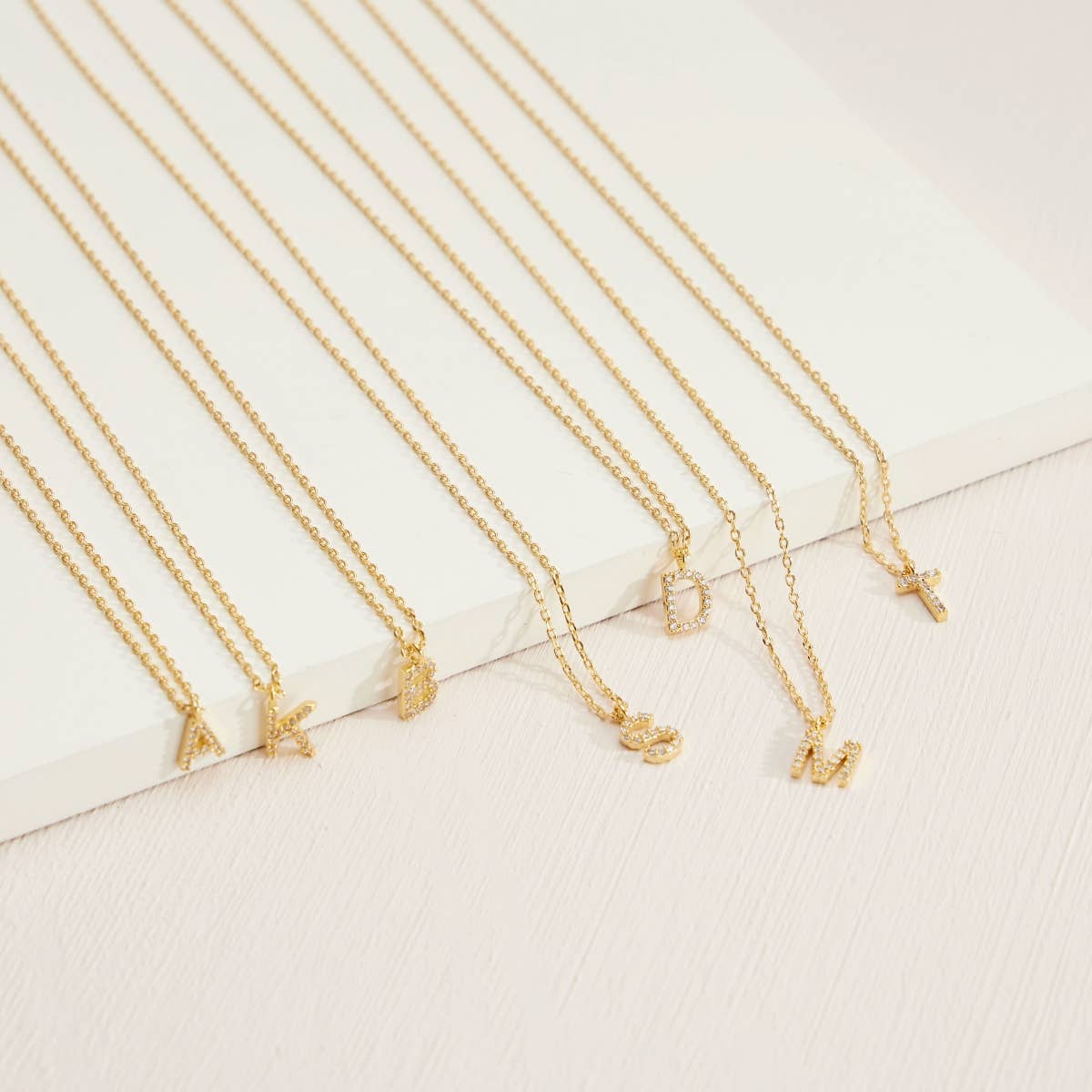 Lilla Haven - 12 Pack of Cubic Zirconia Initial Gold Dipped Necklaces: Gold Assorted / One / 4DN18021