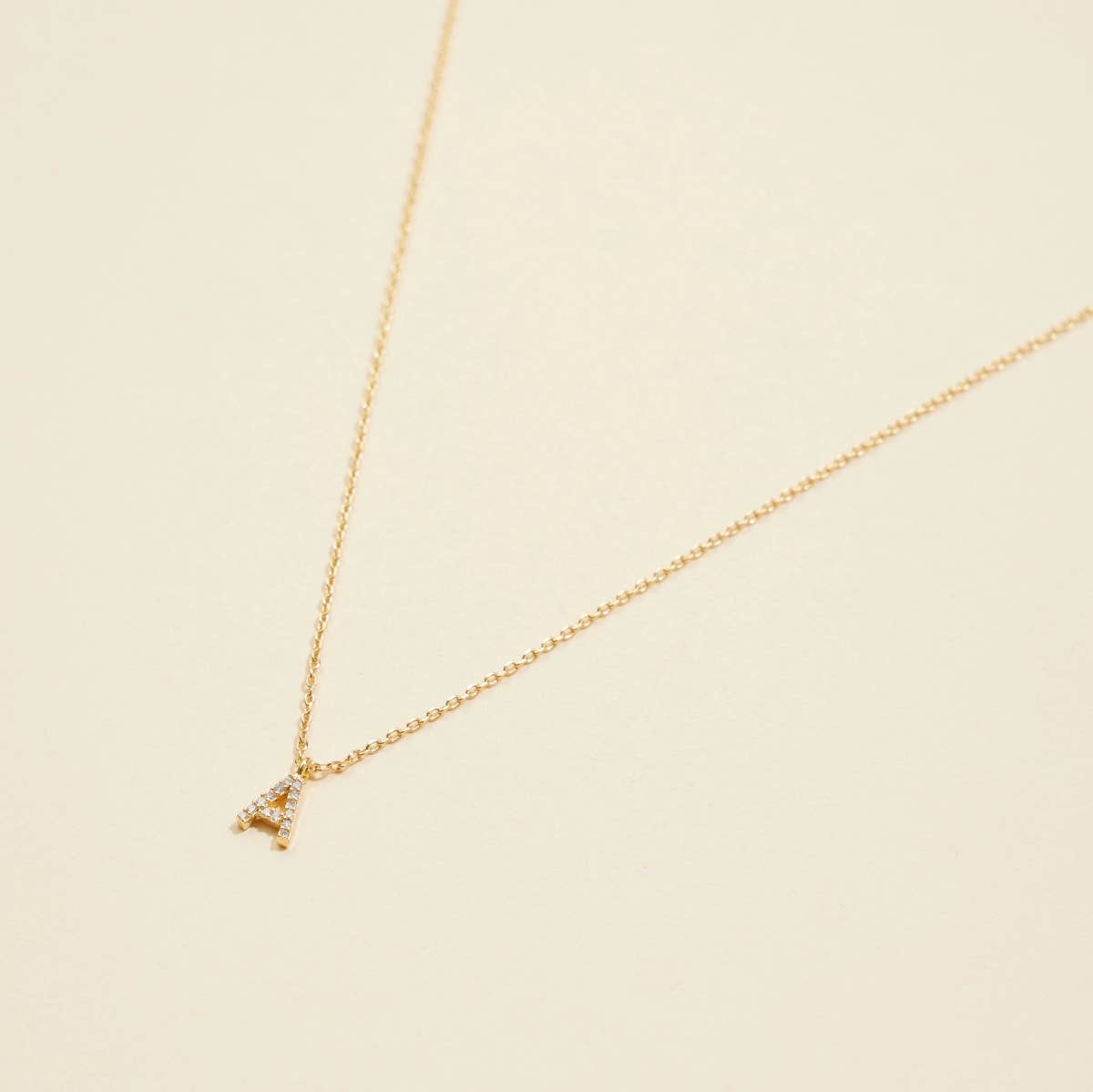 Lilla Haven - 12 Pack of Cubic Zirconia Initial Gold Dipped Necklaces: White Gold Assorted / One / 4DN18021