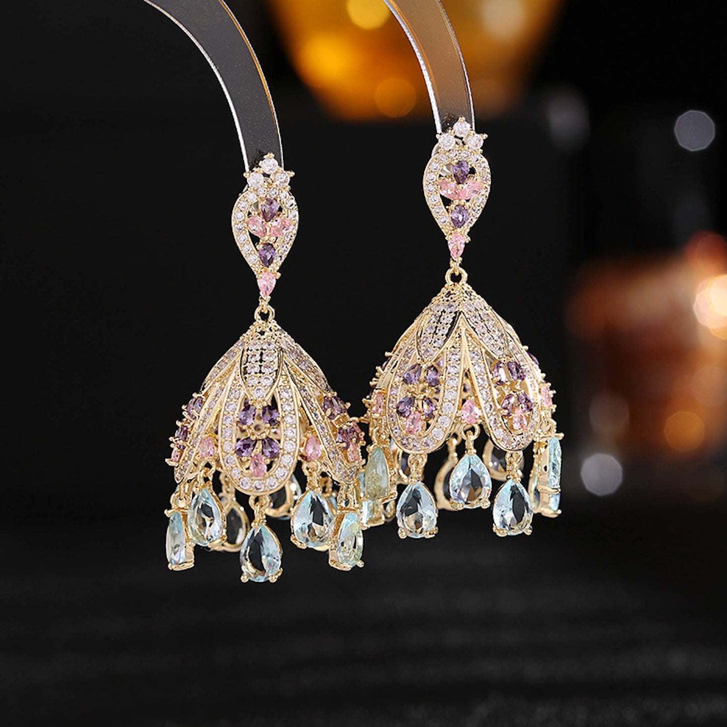 Cici’De Jewelry Amsterdam - Wind Bell-Inspired Royal French Palace Gold-Plated Zirconia: Light blue drop stones